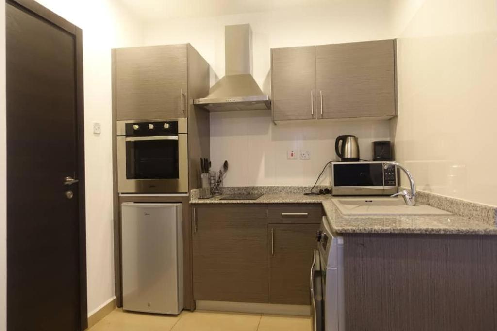 The Gallery Luxury Suites Cpg East Legon Exterior photo